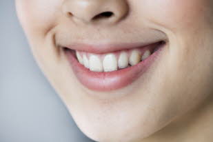 close-up-portrait-of-young-asian-girl-teeth-smiling_53876-14953